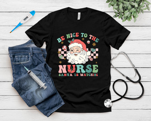 Nurse Christmas Shirt Be Nice To The Nurse Santa Is Watching T-Shirt