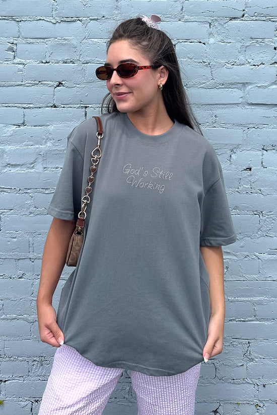 God's Still Working Unisex Tee