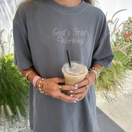 God's Still Working Unisex Tee