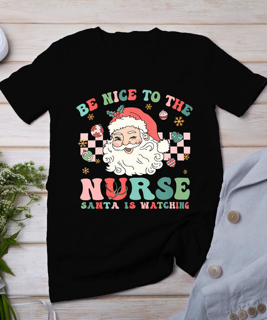 Nurse Christmas Shirt Be Nice To The Nurse Santa Is Watching T-Shirt